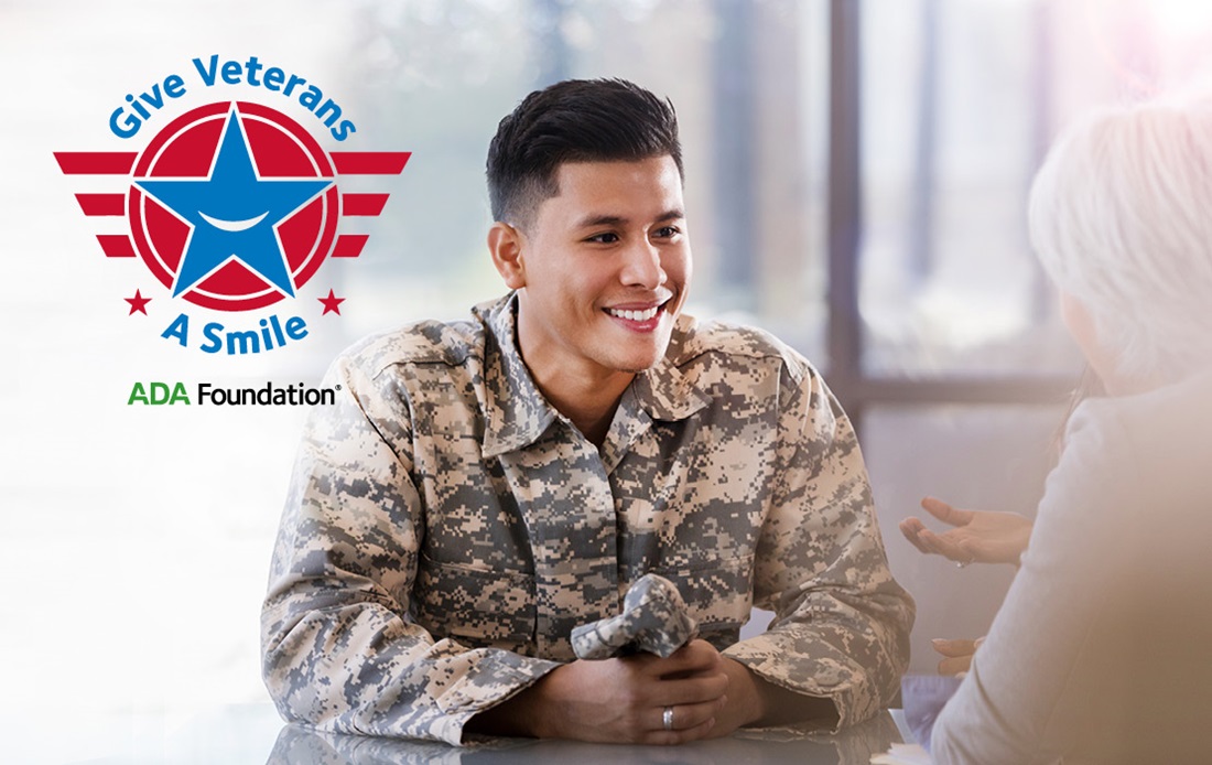 A veteran sitting talking to someone.
